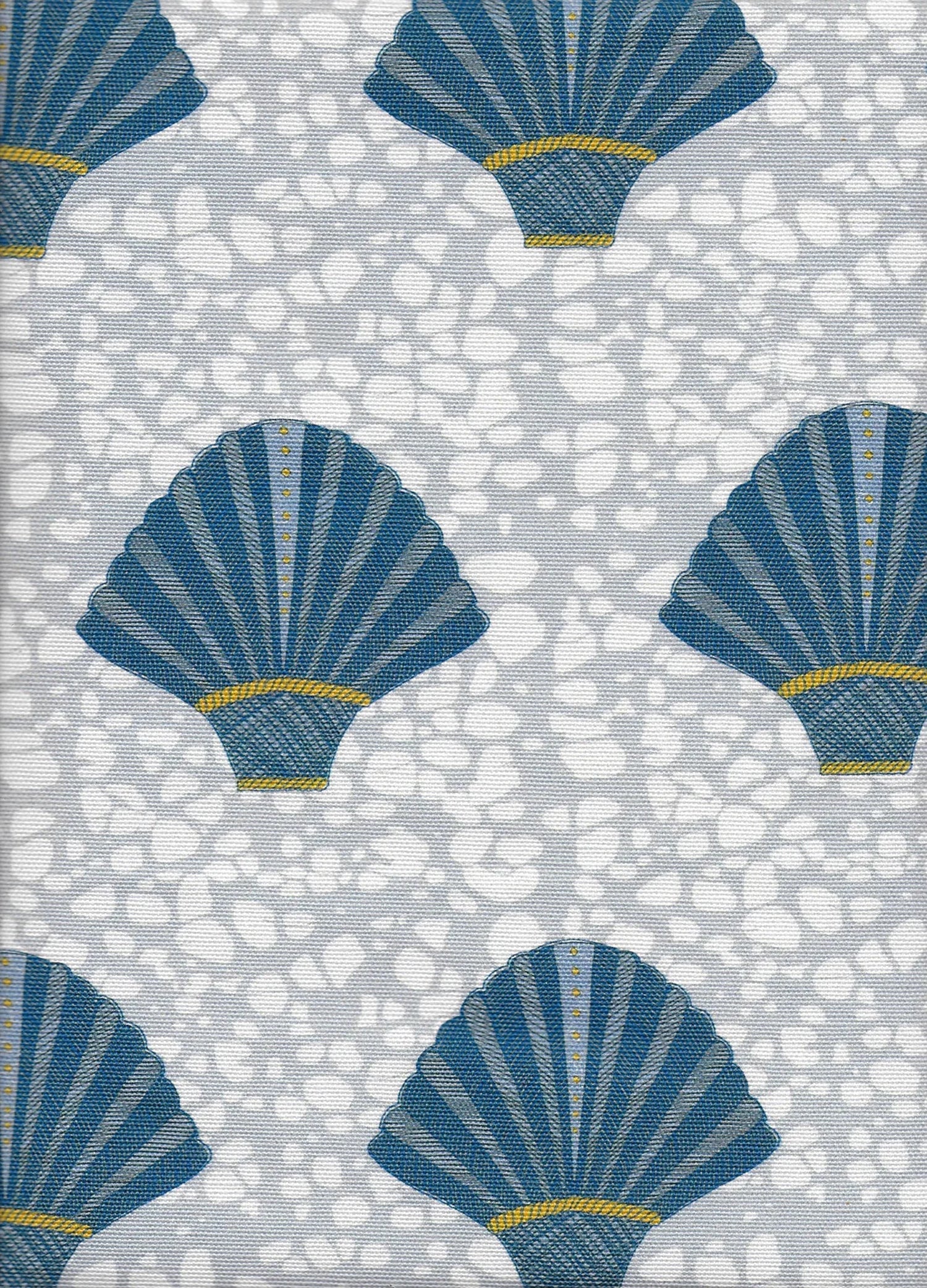 Detail of fabric in a playful fan print in blue and mustard on a mottled blue field.