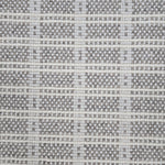 Broadloom carpet in slim plaid pattern in cream and grey.