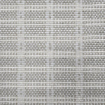 Broadloom carpet in slim plaid pattern in cream and ecru.