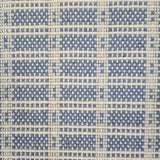 Broadloom carpet in slim plaid pattern in cream and blue.