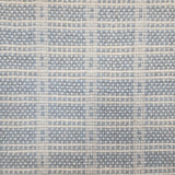 Broadloom carpet in slim plaid pattern in cream and light blue.