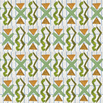 Close up of printed wallpaper with green squiggles, orange striped triangles, light green X marks on a broken grid in blue on a white background. 