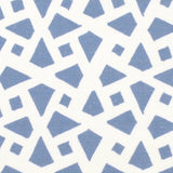 Detail of fabric in a geometric lattice print in blue on a white field.