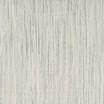 Broadloom carpet in a textural striated pale grey. 