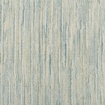 Broadloom carpet in a textural striated sage green.