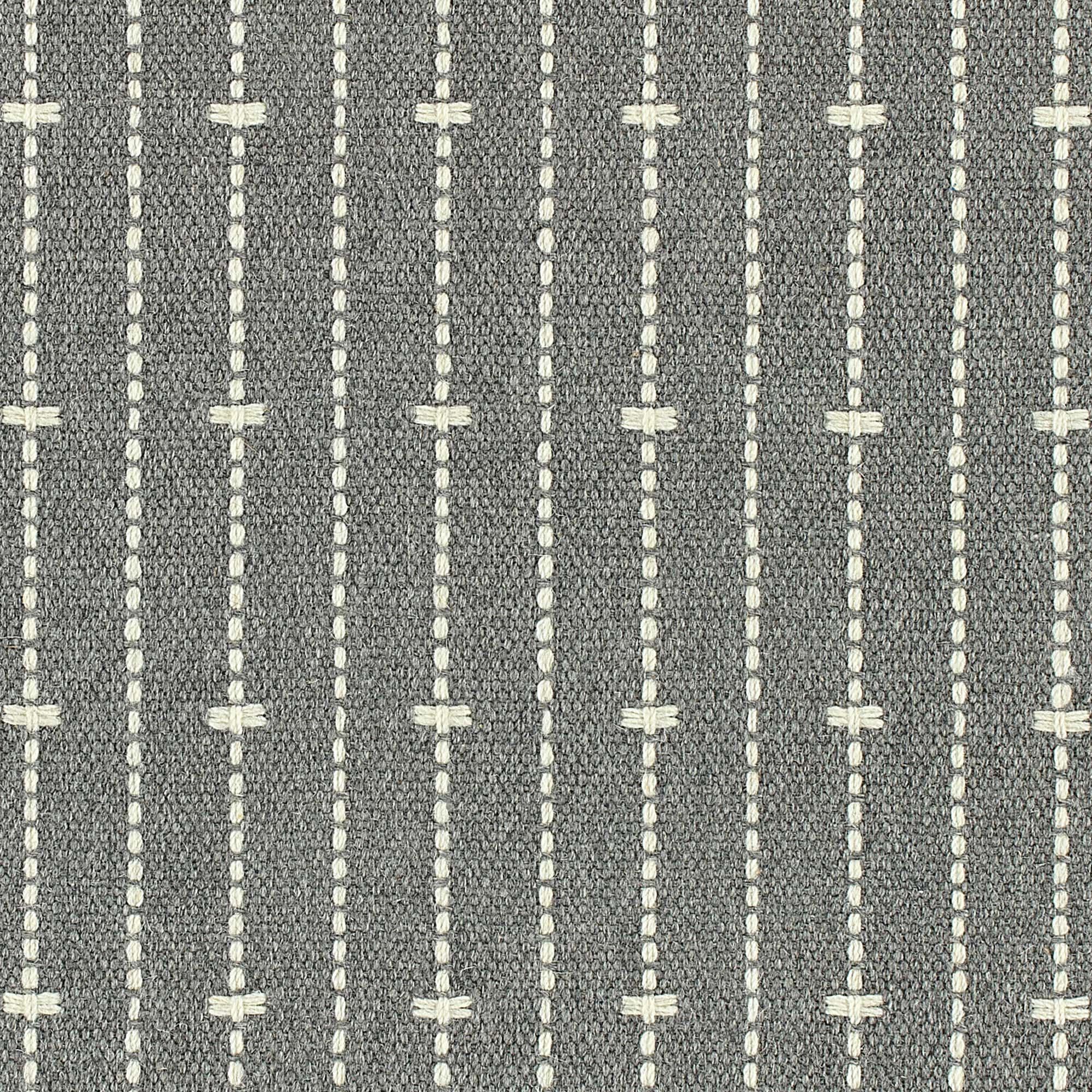Broadloom carpet in ticking stripe in cream on charcoal grey.