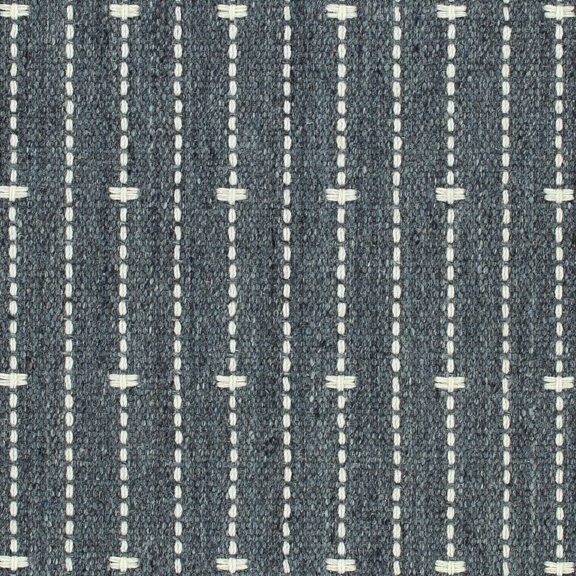 Broadloom carpet in ticking stripe in cream on navy blue. 