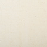 Detail of woven fabric yardage in cream.
