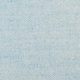 Detail of woven fabric yardage in textured cream and light blue.