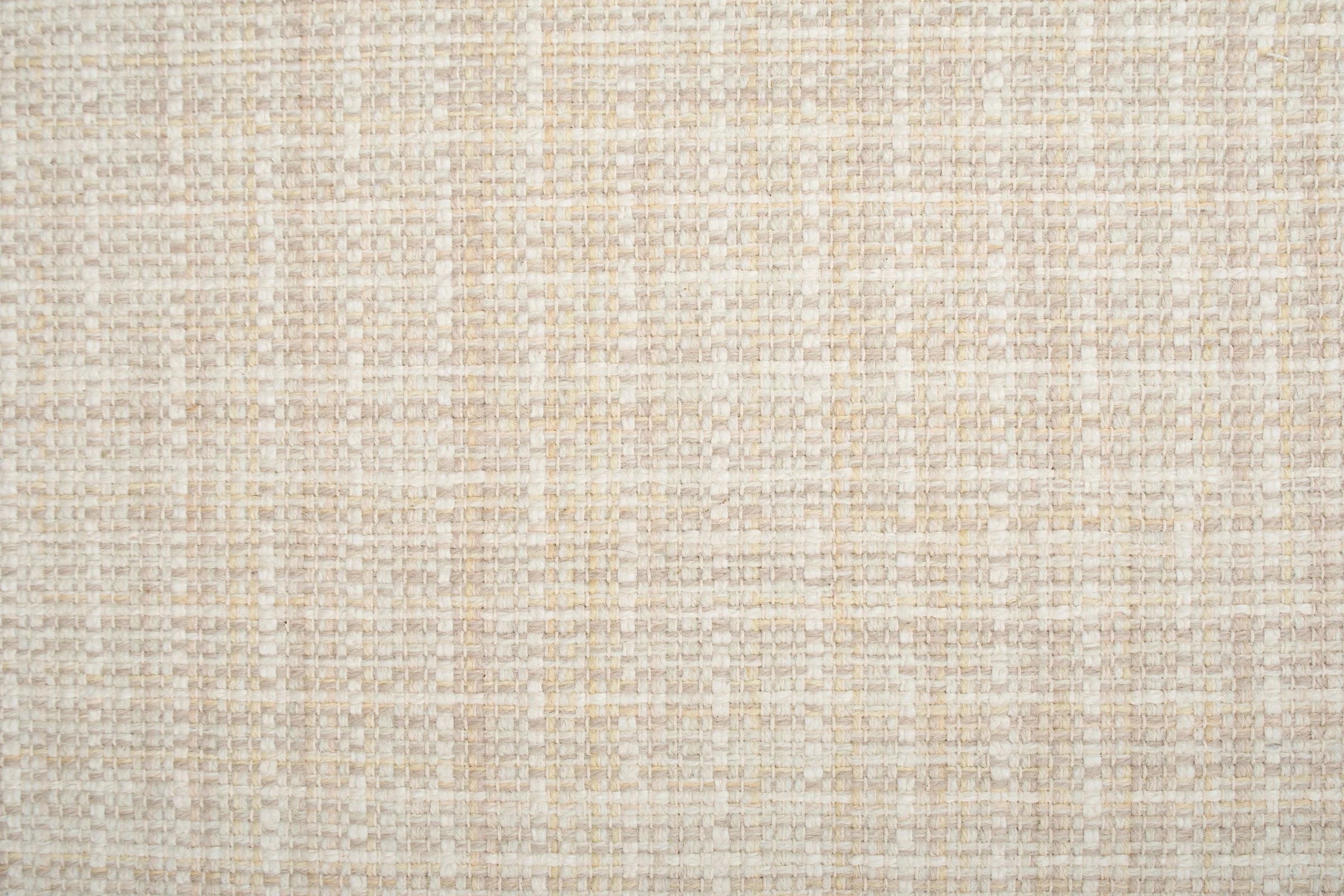 Textured broadloom carpet in beige.