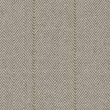 Broadloom carpet in a herringbone in brown with a sage green accent stripe. 