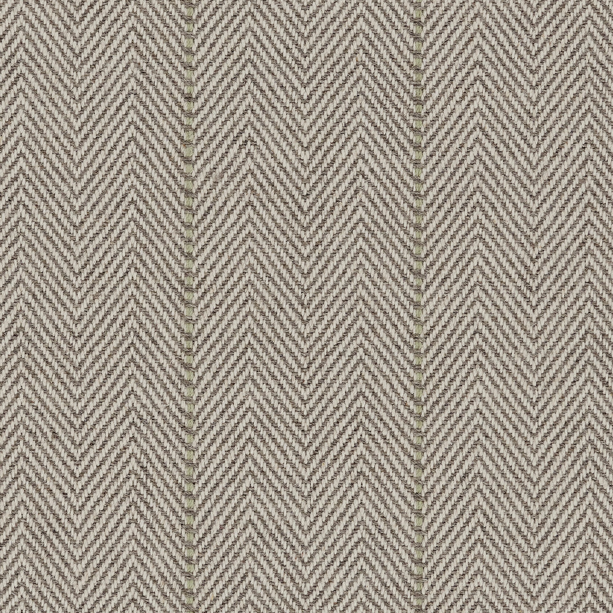 Broadloom carpet in a herringbone in brown with a sage green accent stripe. 