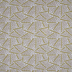 Printed fabric detail in a playful dot and line pattern in pale purple and lemon yellow
