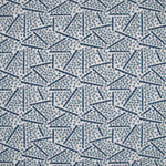 Printed fabric detail in a playful dot and line pattern in sky blue and indigo