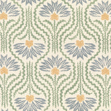 Printed linen in a playful dense blue and yellow with radiating green lines on a cream field. 