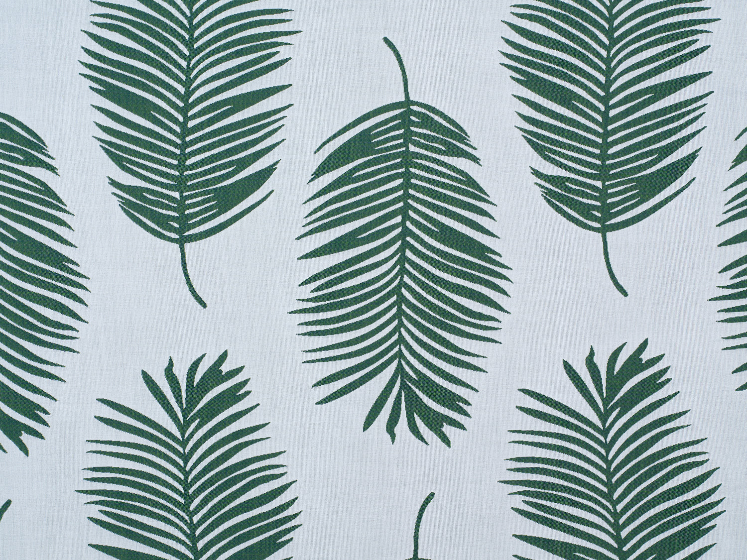 Palm print performance fabric in green on white. 