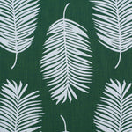Palm print performance fabric in white on green. 