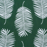 Palm print performance fabric in white on green. 