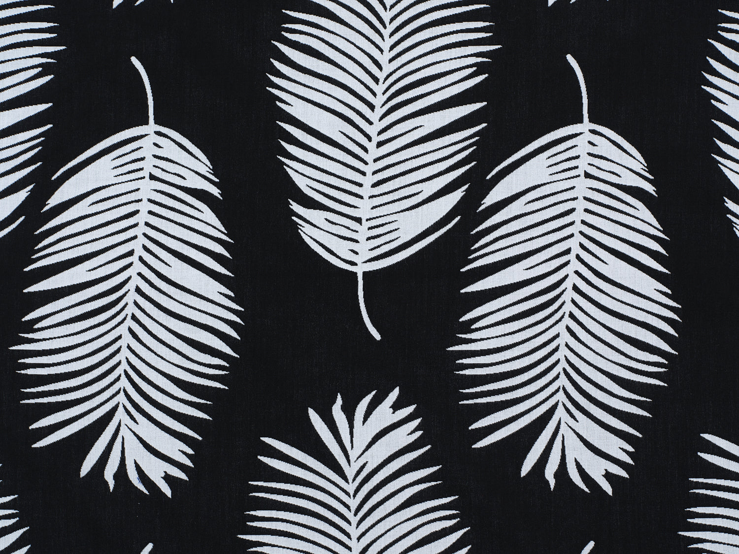 Palm print performance fabric in white on black. 