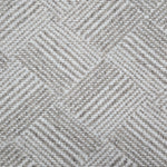 Broadloom rug sample in a diamond pattern in stripes of white and oatmeal. 