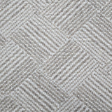 Broadloom rug sample in a diamond pattern in stripes of white and oatmeal. 