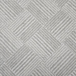 Broadloom rug sample in a diamond pattern in stripes of white and light grey.