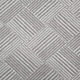 Broadloom rug sample in a diamond pattern in stripes of white and mauve.