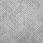 Broadloom rug sample in a diamond pattern in stripes of white and grey.
