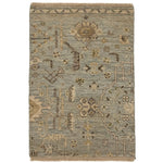 Handknotted rug with old world damask design in blue, cream and grey. 