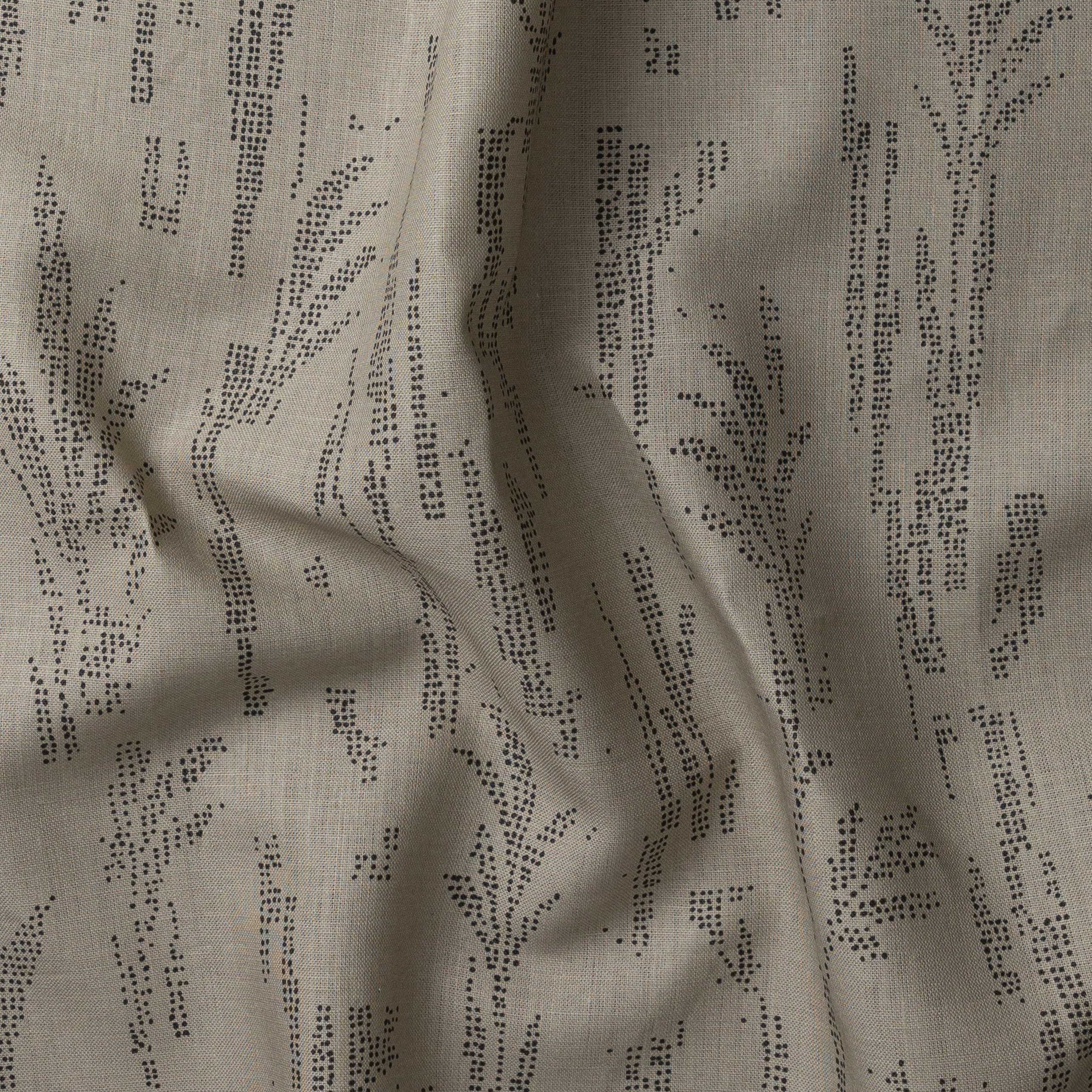 Detail of gently draped printed fabric with a black pointillist wheat frond pattern on a taupe background. 