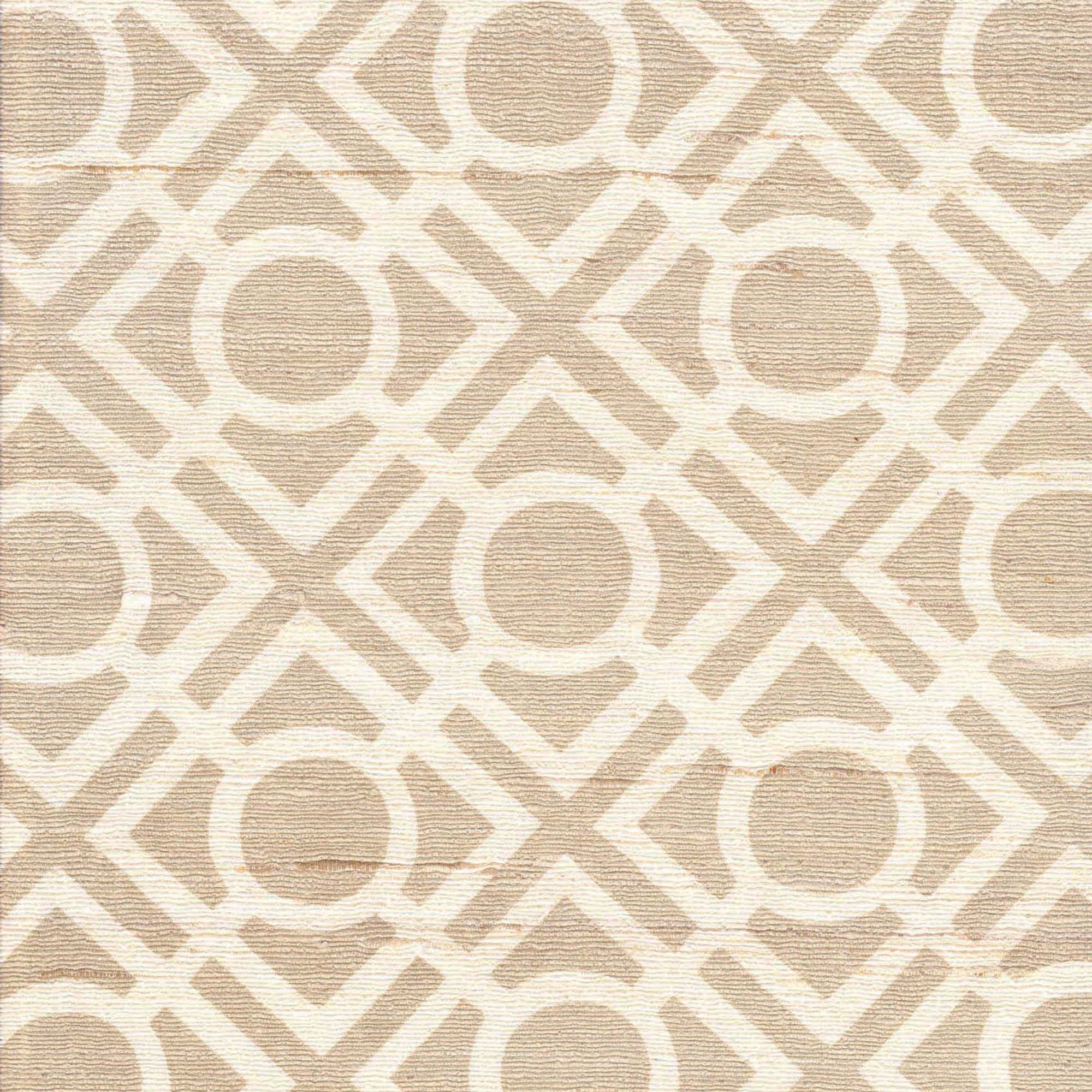 Detail of fabric in a geometric lattice print in tan on a cream field.