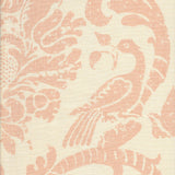 Detail of fabric in a botanical and bird print in light pink on a cream field.