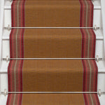 Striped flatweave runner in tan and red on white staircase