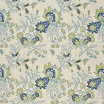 Printed fabric detail in a scrolling botanical print in bright blue, marine blue and light green. 