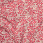 Patterned fabric with floral & vine design on a pink background