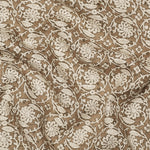 Brown fabric with white floral pattern