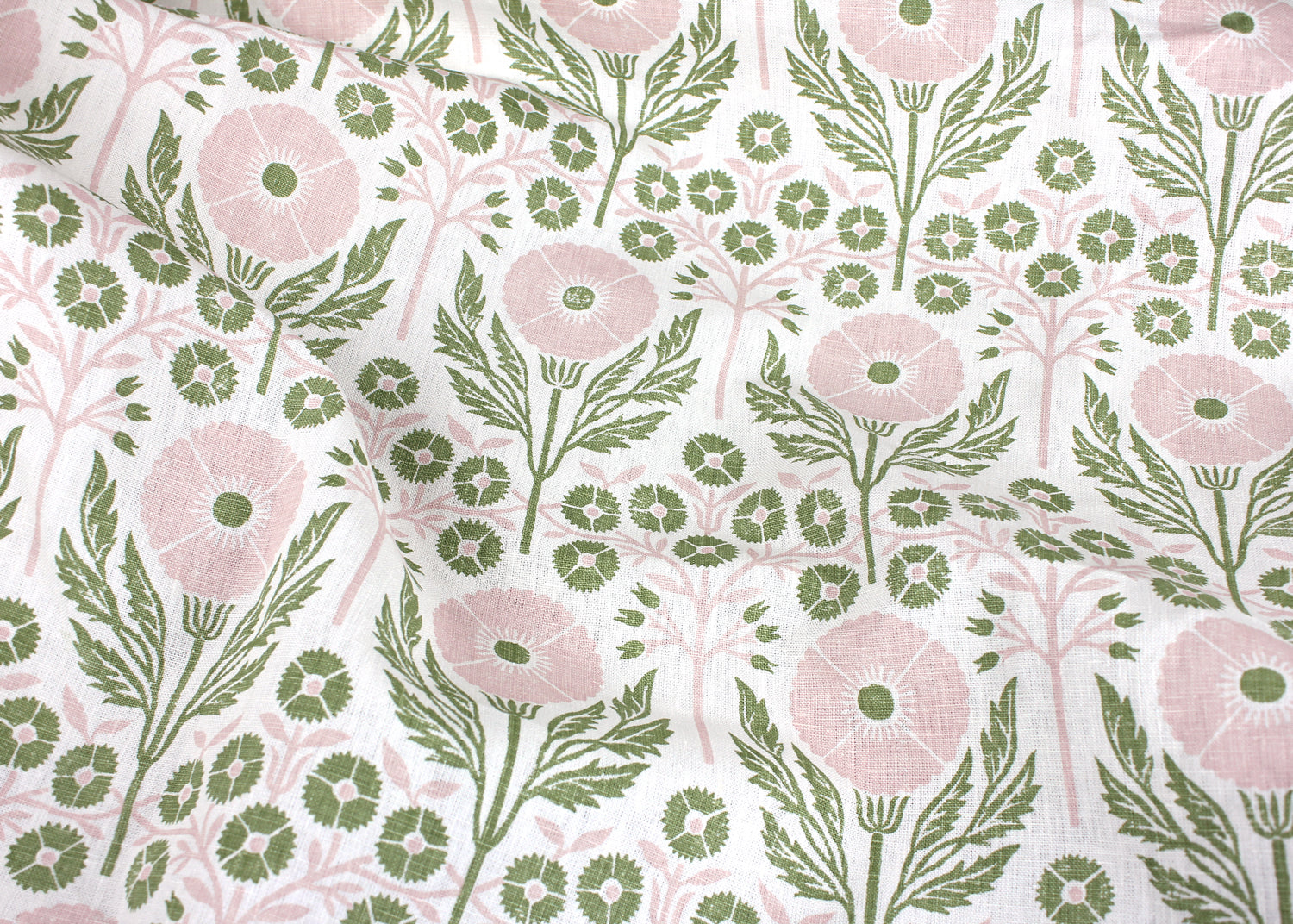 Draped Printed linen in an arts and crafts style floral pattern in pink and green on white. 