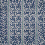 Printed fabric detail in a geometric rhythmic stripe in cobalt blue with a light blue accent. 