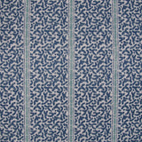 Printed fabric detail in a geometric rhythmic stripe in cobalt blue with a light blue accent. 