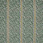 Printed fabric detail in a geometric rhythmic stripe in kelly green with a ochre yellow accent.