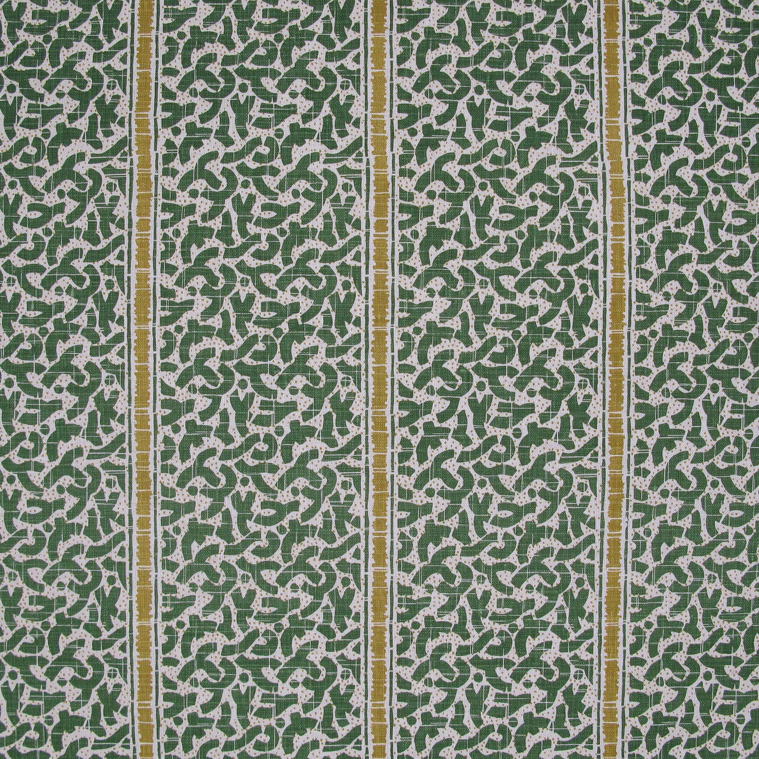 Printed fabric detail in a geometric rhythmic stripe in kelly green with a ochre yellow accent.