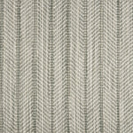 Broadloom carpet in a striated herringbone stripe in cream and muted green. 