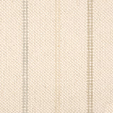 Broadloom carpet in a neutral with widely spaced stripes in shades of tan and grey.