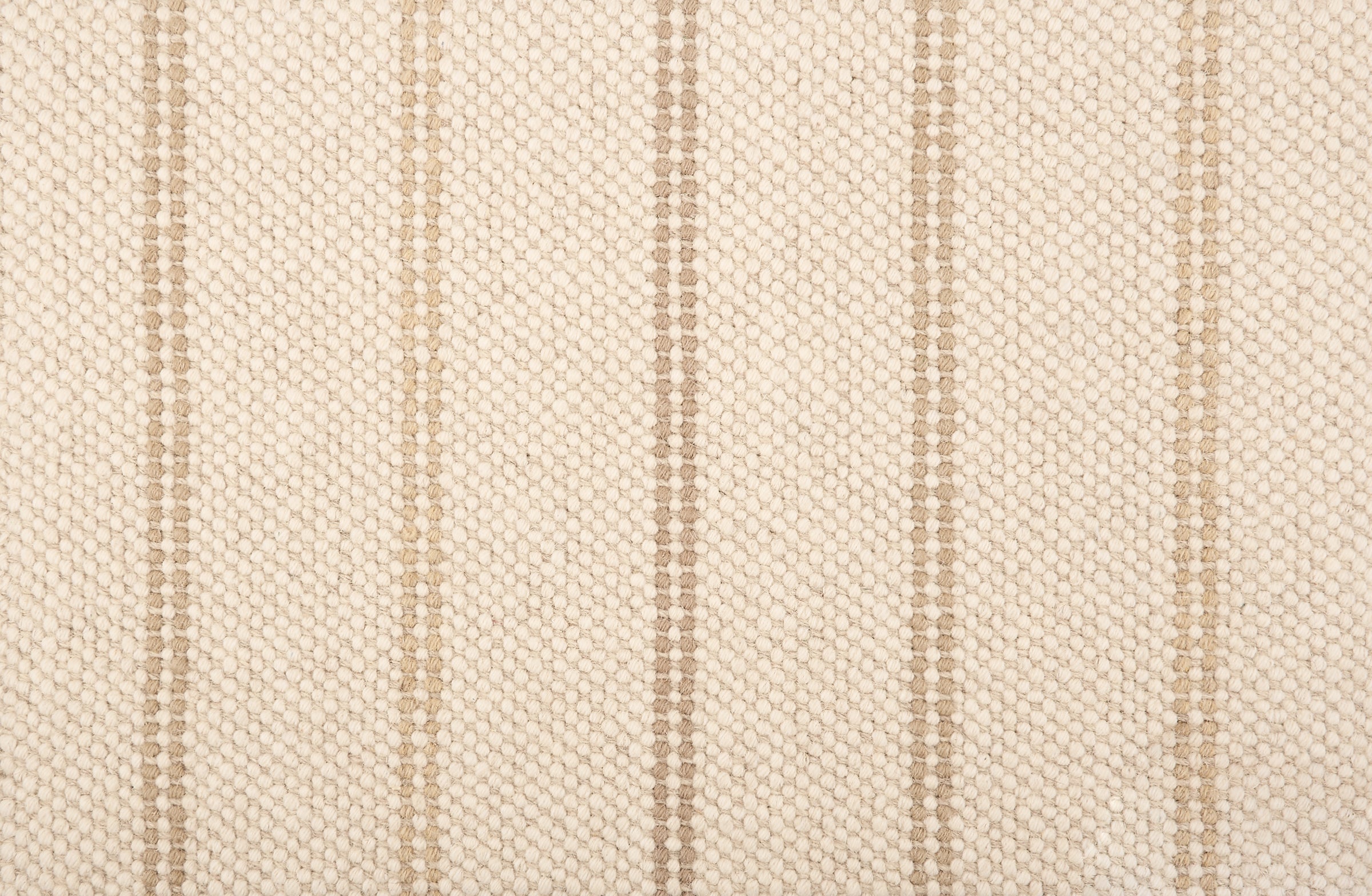 Broadloom carpet in a neutral with widely spaced stripes in shades of tan.