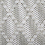 Broadloom carpet in a dimension diamond lattice in cream and taupe. 