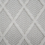 Broadloom carpet in a dimension diamond lattice in cream and warm grey.