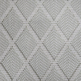 Broadloom carpet in a dimension diamond lattice in cream and grey-green