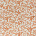 printed linen fabric in a carp and leaf pattern in orange on a beige field.