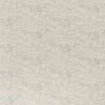 printed linen fabric in a carp and leaf pattern in misty blue on a beige field.
