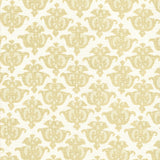 Detail of fabric in a repeating damask print in tan and cream on a white field.